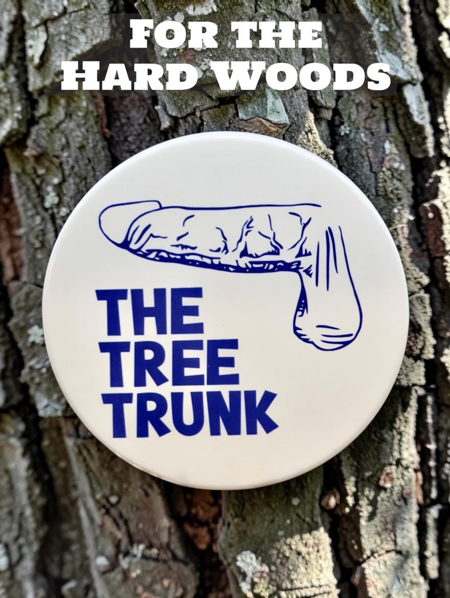 The Tree Trunk Dick Type coaster with blue penis illustration mounted on tree bark — For the Hard Woods