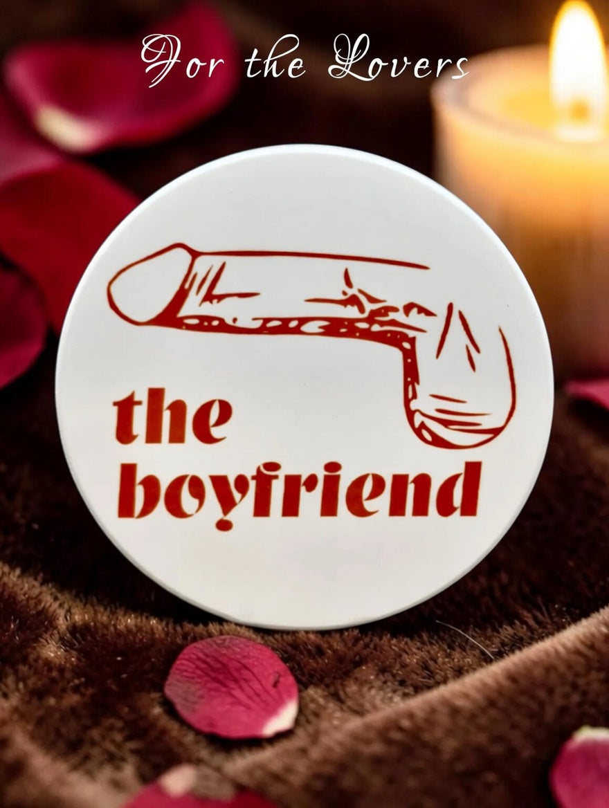 The Boyfriend Dick Type coaster with red penis illustration among rose petals and candlelight — For the Lovers